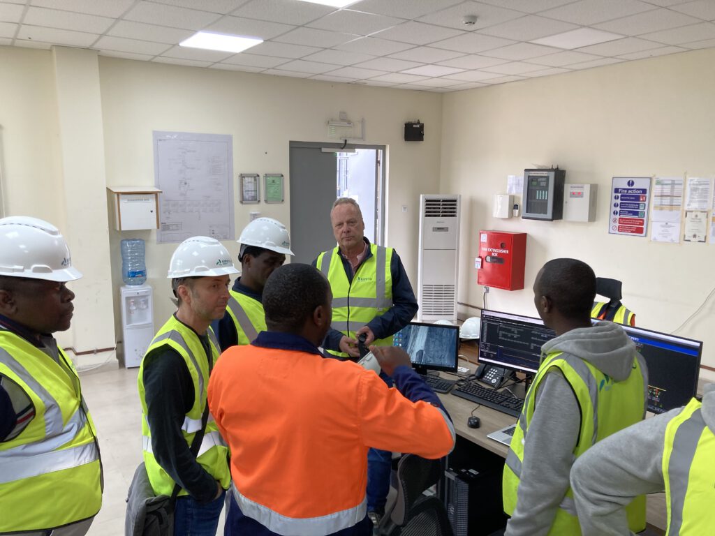 Meeting of the project team in the control room of a wind farm